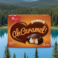 Box of Ah Caramel chocolate cakes with a heart-shaped design on an orange background